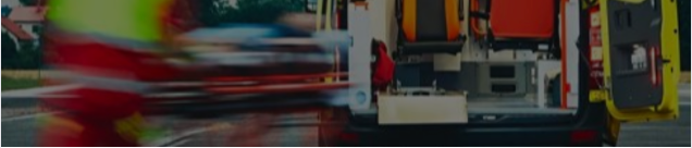 Emergency vehicle at a site under threat, illustrating the A Dark Day: Bomb Threat Microsimulation